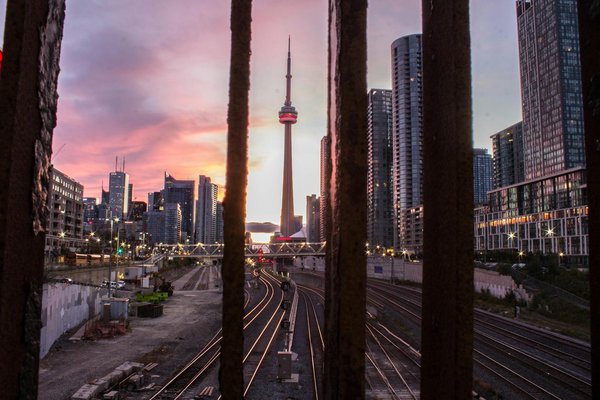 How can you effectively use public transport to explore the hidden gems of Belfast?